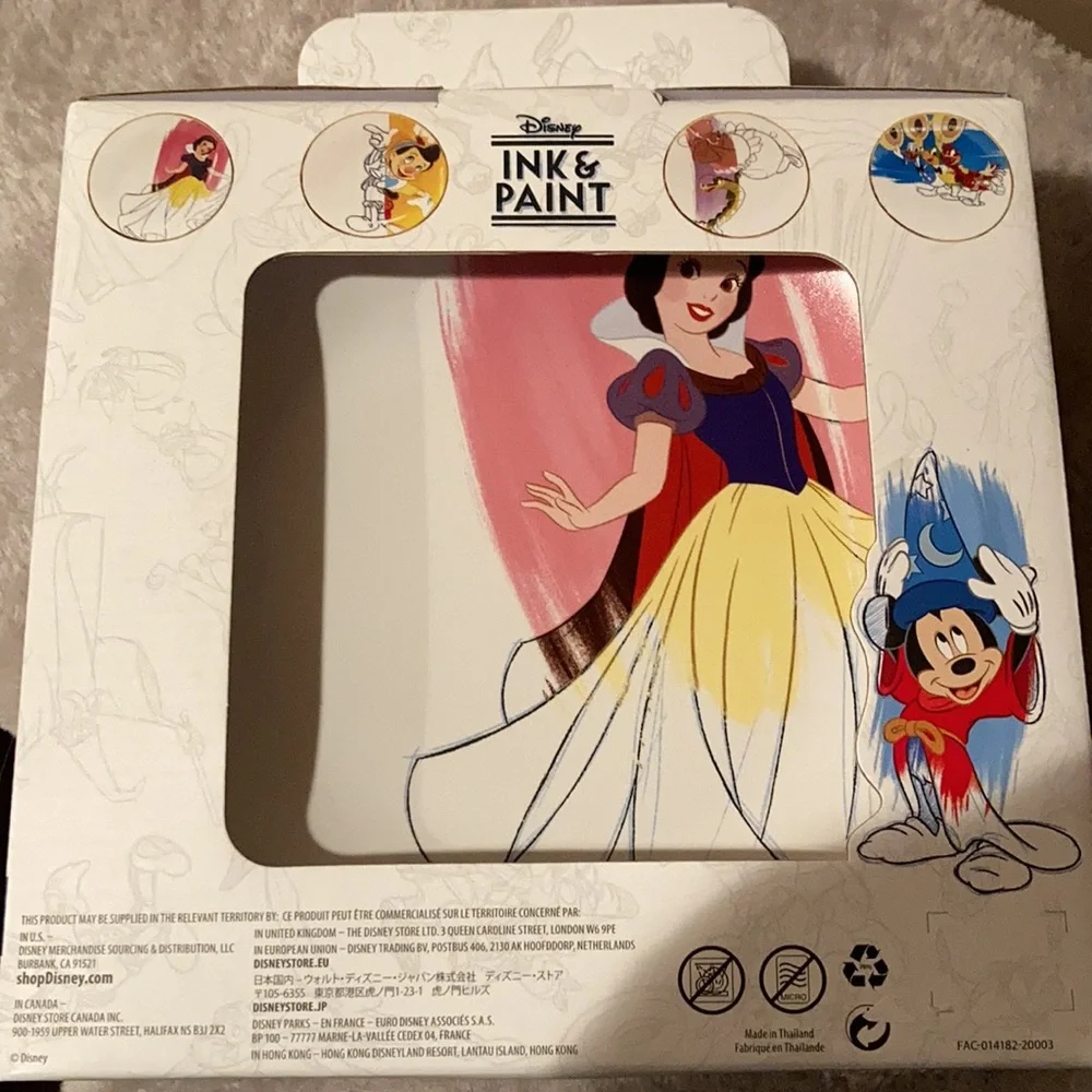 Disney ink and paint set of four plates